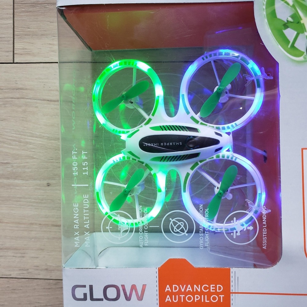 Sharper Image Glow Stunt Drone White Rechargeable LED Quadcopter USB RC Headless